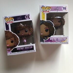 Two Whitney Houston funko pops